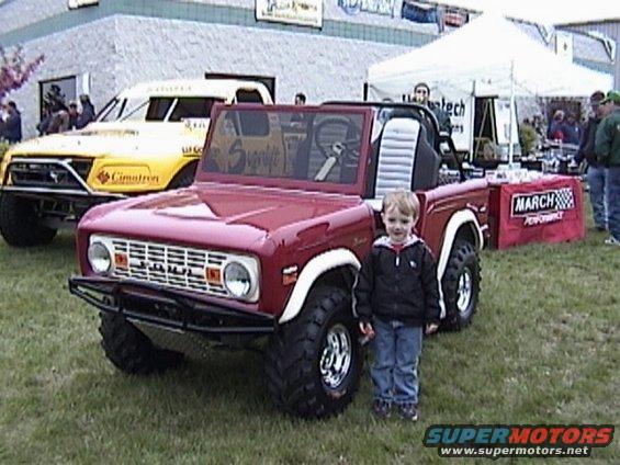 huntergolfcartbronco.jpg My son Hunter in front of a golf-cart Early Bronco