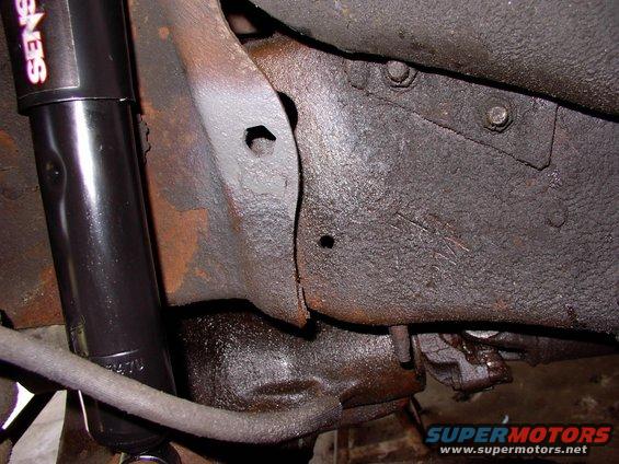 Highlighted in Ford gray is the hole the brake hose is secured into.  After 19 years the hoses and particularly the steel lines they go into were overdue !