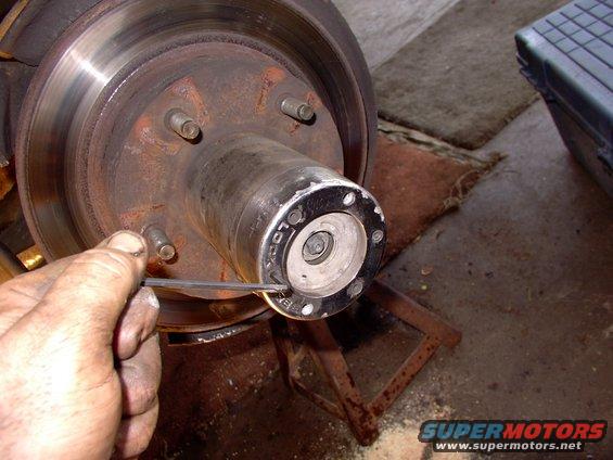 img_0077.jpg Thank goodness my buddy made me buy 12 brand new alan screws from the dealer last year.  They came out easily with all the anti-seize lube on them.