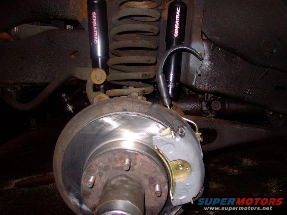 Finished ! New rotors, Timkens wheel bearings, pads, calipers, sliders, brake hoses and lines from them to the union block under the master.