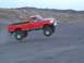 1993 Ford F-350 - This 1993 Ford F-350 takes flight over a sandy terrain.