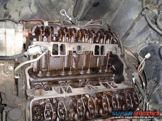 picture-105.jpg everythings off, it doesnt look bad in here except the drivers side has a lot of carbonized oil all over it.  I later noticed on the intake it appeared the EGR was leaking on that side.  It would be cool if this helped/ cured my "blowby" problem