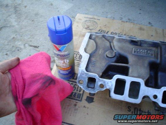 picture-107.jpg cleaning off the remaining crap with carb cleaner and a clean rag.