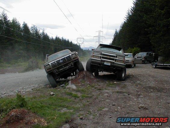 1987 Ford F-150 and a Chevrolet K5 Blazer off-roading