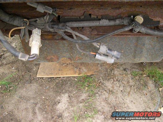 Wiring harness and connectors on rusty frame