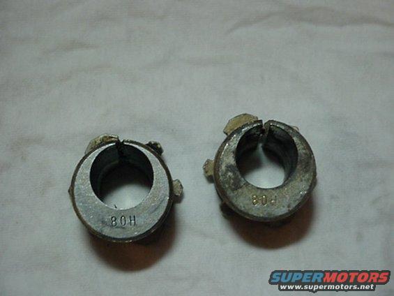 Two metal hose clamps with '80H' and '80-' markings
