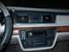 1992 Ford Crown Victoria - Dashboard view of a 1992 Ford Crown Victoria, showing the center console with radio and climate controls.