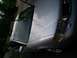 1999 Audi A6 - The front corner of a silver sedan, likely a 1999 Audi A6, is visible in this exterior shot.
