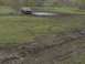 1981 Ford Bronco - SUV navigating a muddy obstacle course.