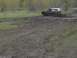 1981 Ford Bronco - This 1981 Ford Bronco navigates a muddy terrain, kicking up dirt as it goes.