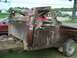 1990 Ford F-150 - This heavily damaged 1990 Ford F-150 pickup truck shows extensive cab and roof damage, indicating a severe impact.