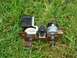 1990 Ford F-150 - This HVAC blower motor assembly is shown resting on a patch of grass.