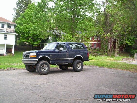 Dark blue 1994 Ford Bronco parked on asphalt