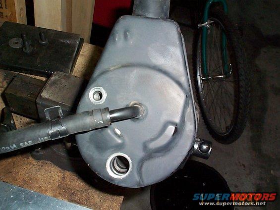 dcp01266.jpg The resevoir for my pump on had the two holes, some have a 3rd hole. Make sure the high pressure fitting hole and the other bolt hole are both lined up.