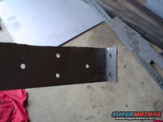 holes drilled in bracket to rivet to ammo can