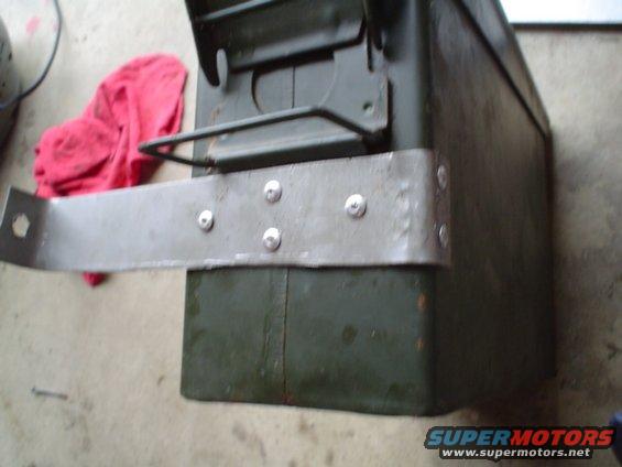 riveted in place