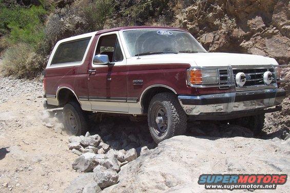 1992 Ford Bronco navigating rocky terrain