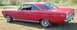 1966 Ford Fairlane - The rear quarter panel of a red 1966 Ford Fairlane shows the 'Fairlane 500' badging.