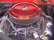 1966 Ford Fairlane - Close-up of an engine bay, focusing on the air cleaner assembly and surrounding components.