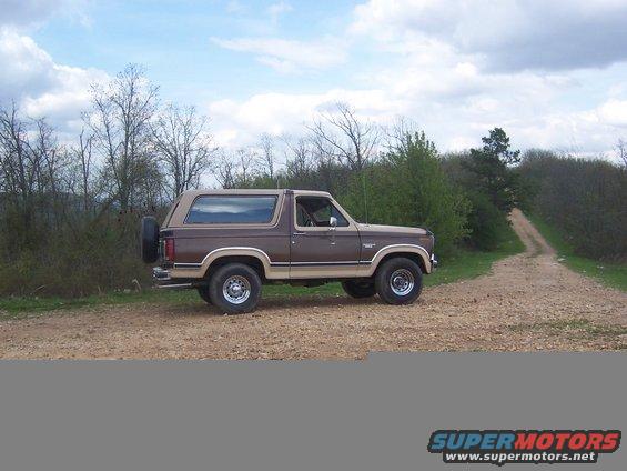 Side view with my stock suspension. I have added a 2" body lift since these. I'll post them soon.