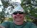 1998 Ford Crown Victoria - Man wearing a tinfoil hat and sunglasses poses for a selfie outdoors.
