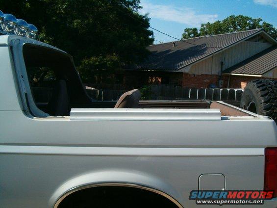 Cut part of bronco top where the snaps will be installed