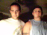 Two young men posing for a photo