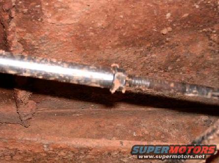 The old adjuster nut reused as a jamb nut.
