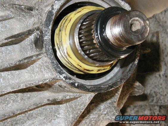 once the seal is out you can push out the rear output drive gear.  make sure the driven gear is taken out first though.