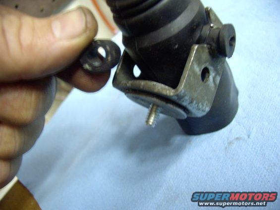 img_0242.jpg An old Austin trick. Stuff a piece of fuel hose between the actuator housing and the bolt to hold it still while you install it.  Leave it in or pull it out, your choice.