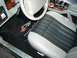1996 Chevrolet Impala - Interior view of a 1996 Chevrolet Impala, custom floor mats with an SS badge and checkered flag.