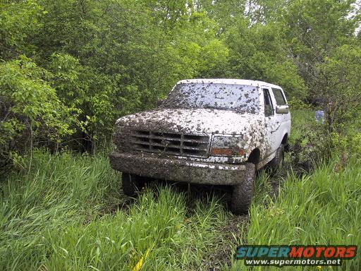Mud-covered 1993 Ford Bronco 3q-front view