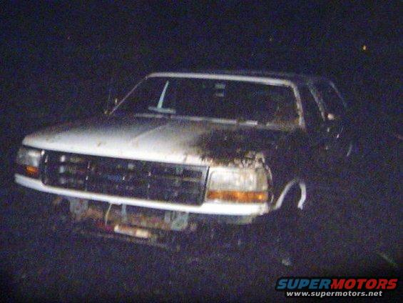 1993 Ford Bronco front with damaged grille and hood