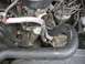 1989 Ford Bronco - metal braiding on the second hose (going to the heater core), and how I routed it to make room for all of the wires I r…