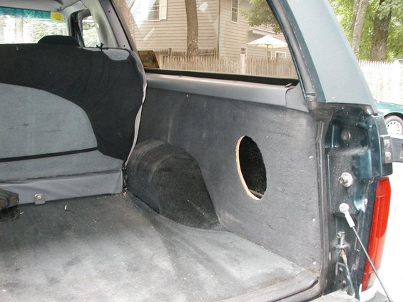 1994 Ford Bronco interior cargo area with speaker cutout in side panel