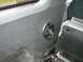 1994 Ford Bronco - Interior shot showing an aftermarket speaker installed on the side panel of a vehicle.