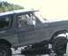 1985 Ford Bronco - This vintage Ford Bronco is shown from the front three-quarter view, highlighting its exterior.