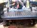 1990 Ford Bronco - Applying bedliner to the interior of a 1990 Ford Bronco.