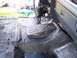 1990 Ford Bronco - The interior floor of a vehicle has been coated with a black spray-on bedliner material.