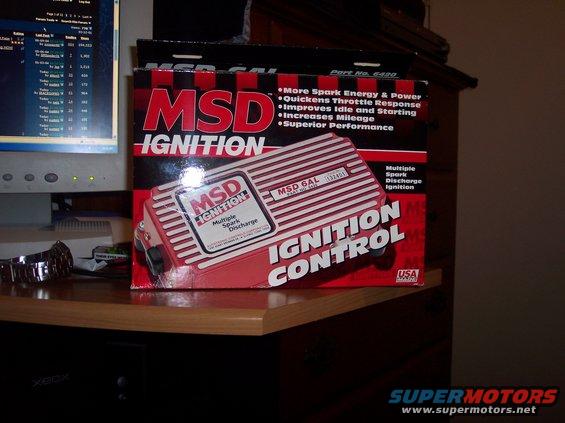 MSD Ignition Control box on a wooden desk next to a computer monitor