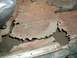 1979 Ford Bronco - The interior floor pan shows extensive rust damage and holes.