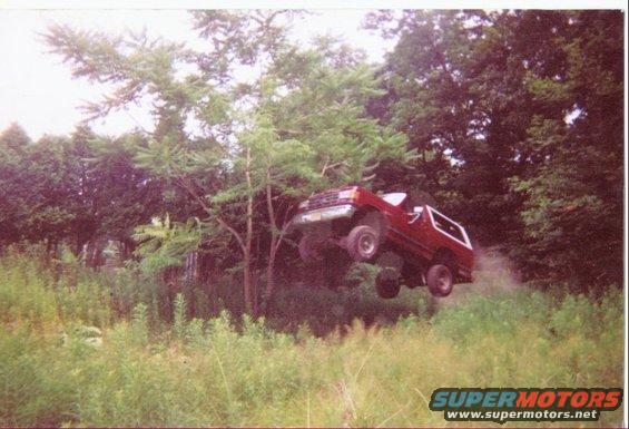 1.jpg me getting 10ft of air    with 31 inch tires      soon replaced leaf springs   bounced about 3ft after landing      did it 3 times in one day