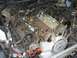 1996 Ford Crown Victoria - Close-up view of a disassembled engine, revealing the valve train and associated parts.