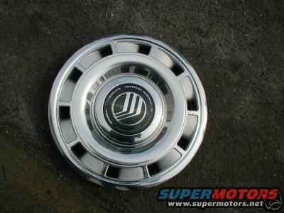 Mercury Grand Marquis hubcap with "GRAND MARQUIS" text