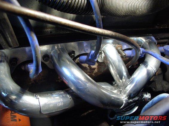 Now who was worrying about plug wire routing ? The stock angled 135 degree Taylor Spiro Pro boots clear with plenty of room everywhere!