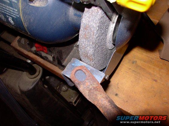 img_0529.jpg Clearance grinding the air pump brace first, then the uppar intake brace. Both go on the one stud I put on this side instead of a header bolt.  I'm letting the air pump pipe float, tie-wrapped away from the headers.