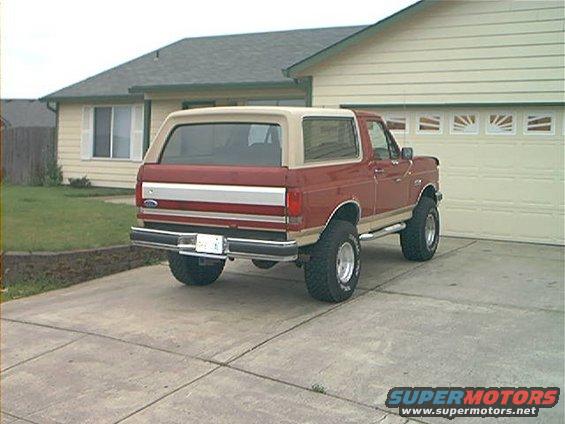 1990 Ford Bronco parked in driveway, rear view