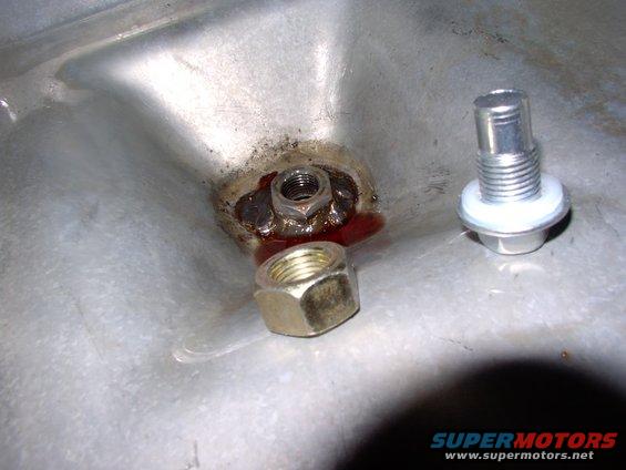 img_0595.jpg A $2 oil pan bolt and 65 cent nut and bit of welding is all you need.