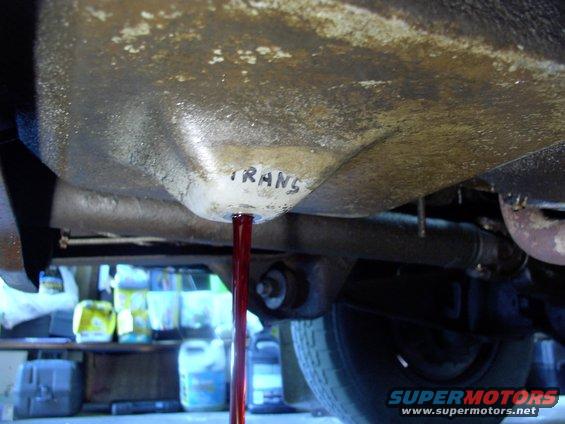 img_0548.jpg What a treat being able to use this drain plug I welded in last year, instead of getting the red hair conditioning oil all over me. No mess at all.