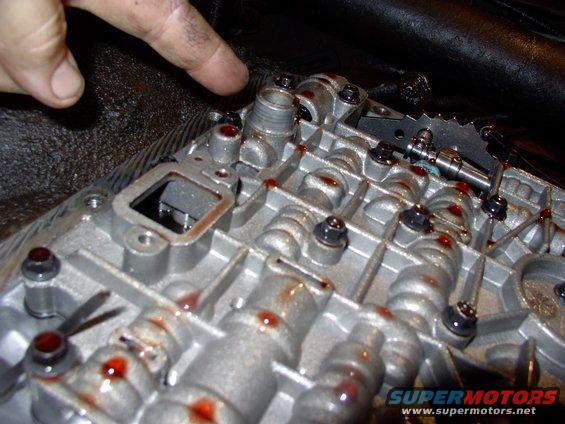 img_0584.jpg Here's the valvebody without the filter on it. Note the round snout there. That's the one people tell you to make sure only one seal goes back on as the old one often stays on the snout.